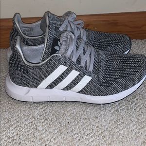 NEVER WORN Adidas size US 5 1/2. Fits a 7 in women